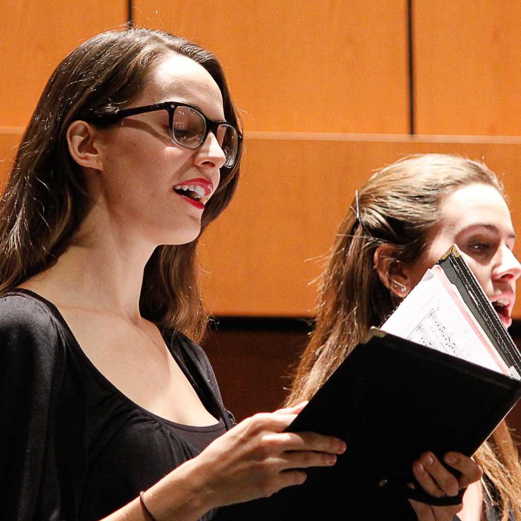 Palomar Chamber Singer Nicole Di Gangi (left), performs at the Howard Brubeck Theatre on Nov. 12, 2014. The Palomar Chamber Singers showcased selections from J.S. Bach, Sergei Rachmaninoff, Carlos Guastavino and Rafael Alberti. (Coleen Burnham/The Telescope)