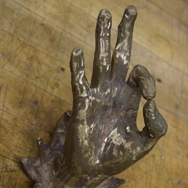 After some cutting and filing, Ricardo Baza’s bronze piece works as a beautiful stand to hold a stick of insence. (Michaela Sanderson/The Telescope)