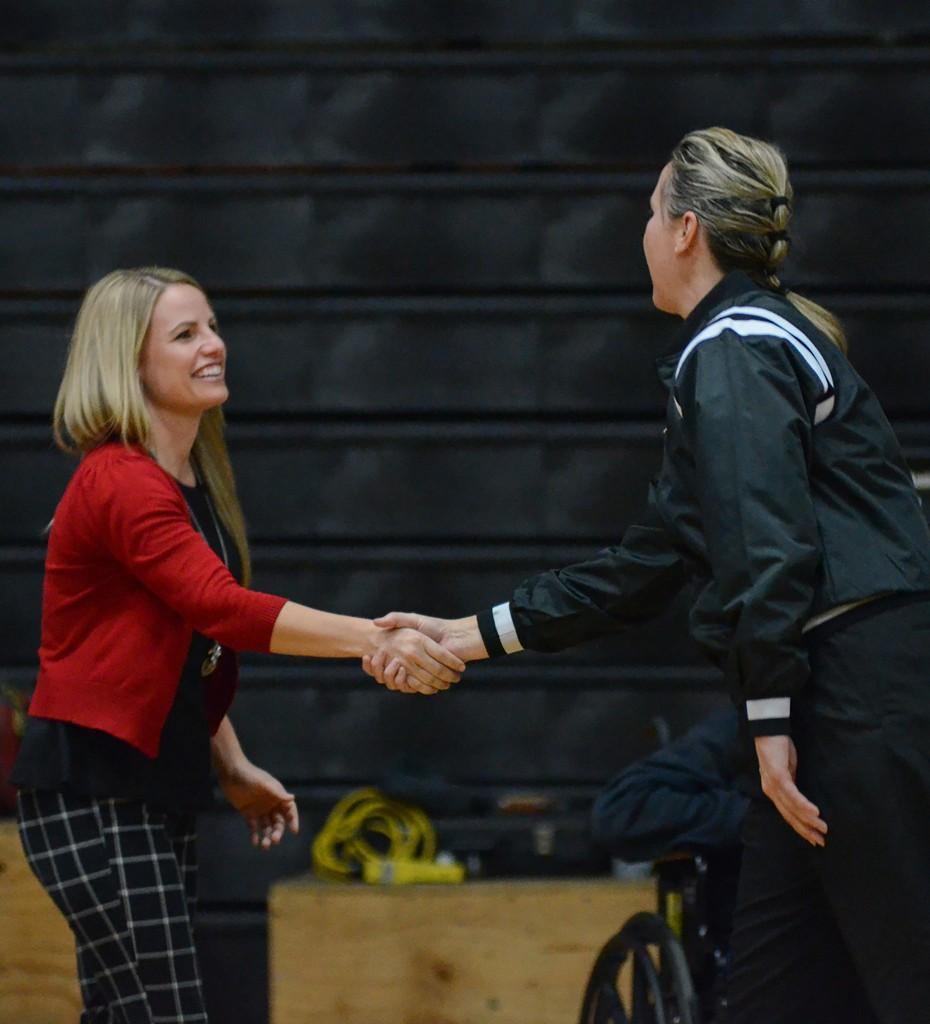 Palomar Head Coach Leigh Marshall shakes hands with a referee before the Southern Regional Playoffs Second Round game vs. College of the Canyons began on Feb. 26, 2016 at the Dome. Palomar won 77-54. (Tracy Grassl/The Telescope)