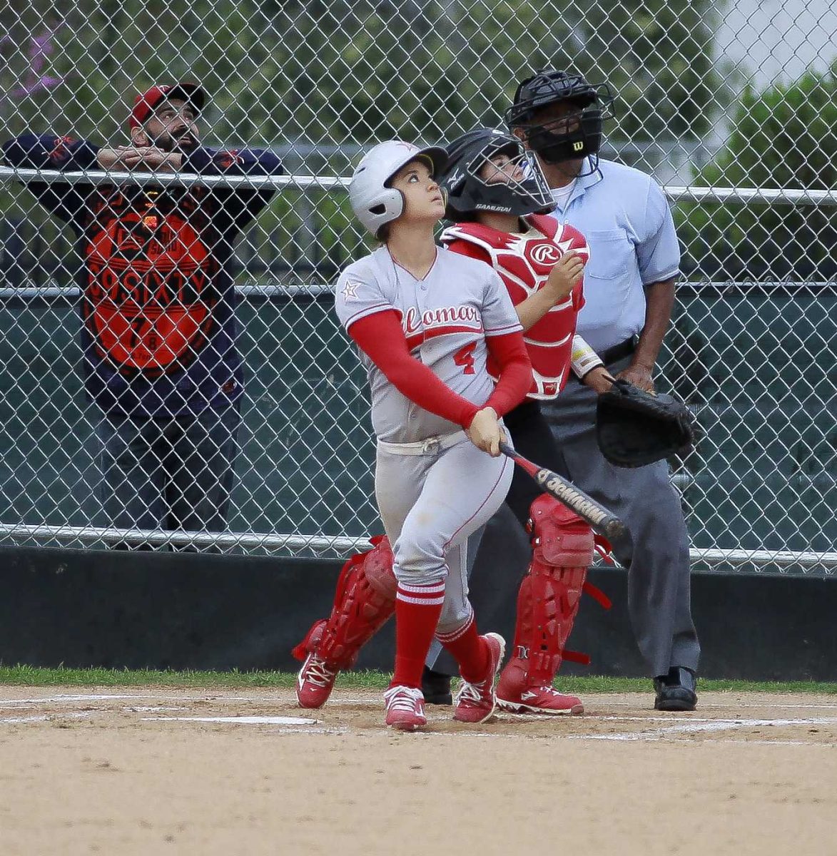 All eyes follow a foulball by Palomar's Brooke Huddleson's during the March 11, 2016 game against Mt. San Jacinto at Palomar College Softball Field. The Comets won the game 9-1. (Stephen Davis/The Telescope)