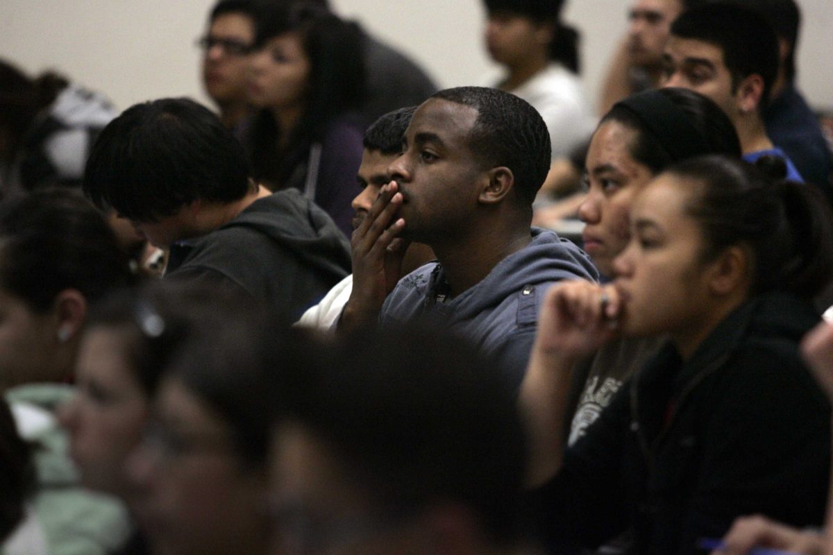 Students listen to a lecture during a General Chemistry section at San Jose State University.