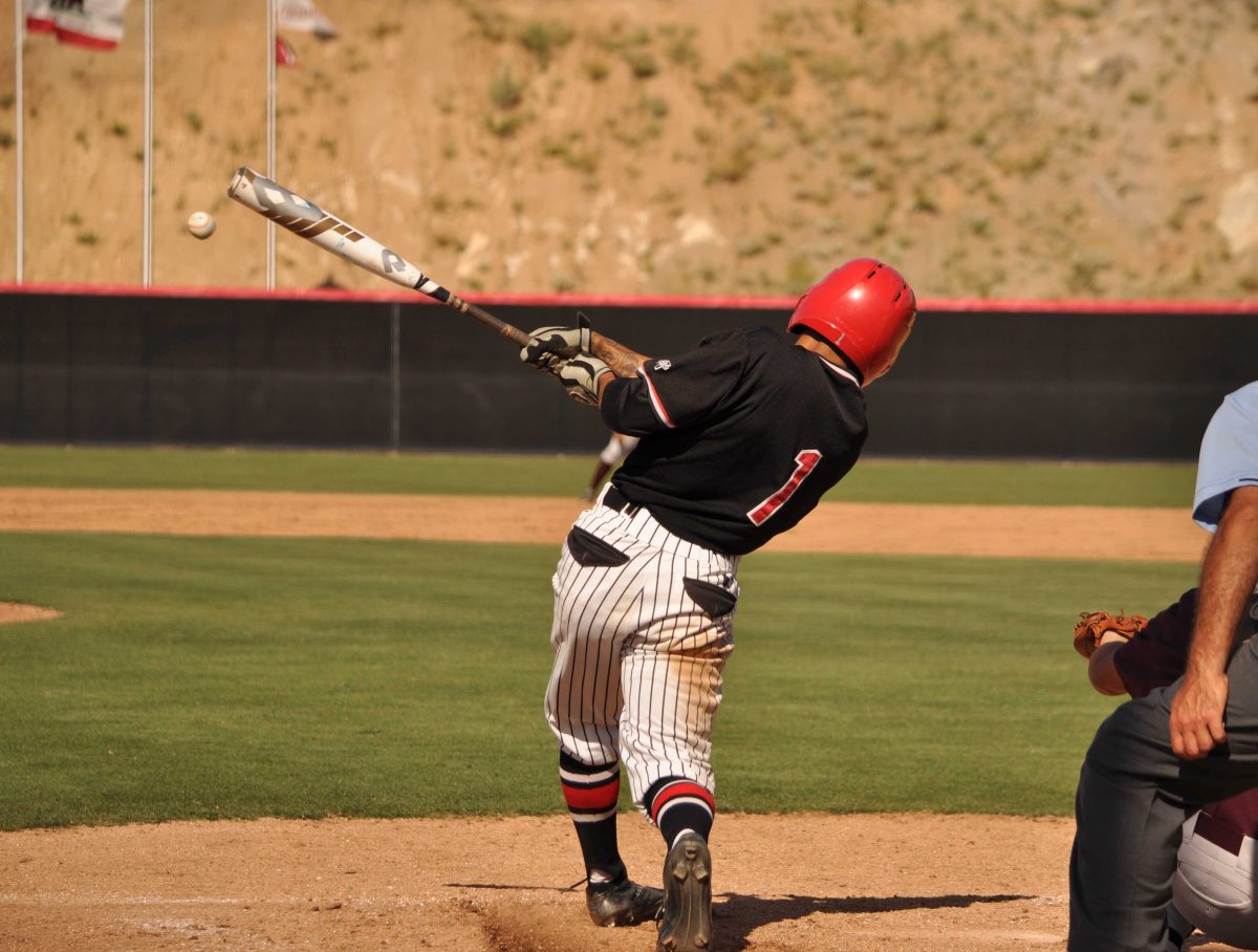 Palomar's Nashea Diggs (1) makes solid contact for a hit into left field against Southwestern College on April 21, 2016 at Palomar College Ballpark. Palomar went on to win 12-7. (Aaron Fortin/The Telescope)