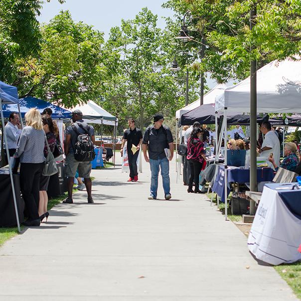 Palomar students participate in Career Day that took place on the grassy area of the Student Union on April 27. Employers such as BridgePoint, LegoLand, Chula Vista Police Department were only a few businesses that students could inquire information from. (Tracy Grassel/The Telescope)