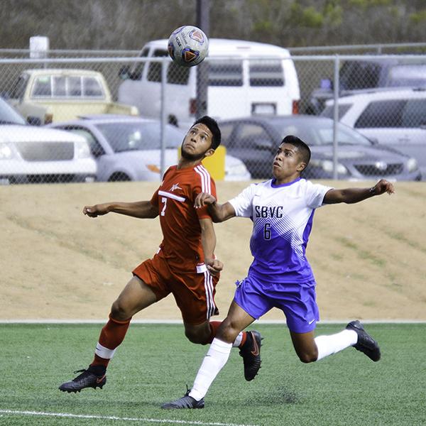 Palomar midfielder Elijah Lopez (7) and San Bernardino Valley College forward Jakob Salinas (6) fight for possession of an airborn ball. Sept. 27, 2016 on Minkoff Field. (Dylan Halstead/The Telescope)