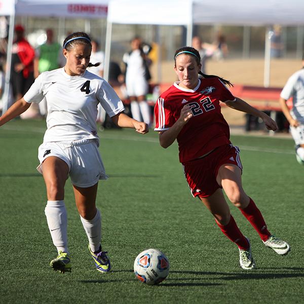 Palomar forward Grace Busby (22) charges her way downfieild. Palomar was defeated 0-3 by Mt. San Jacinto College on Sept. 23, 2016. (Bruce Woodward/The Telescope)