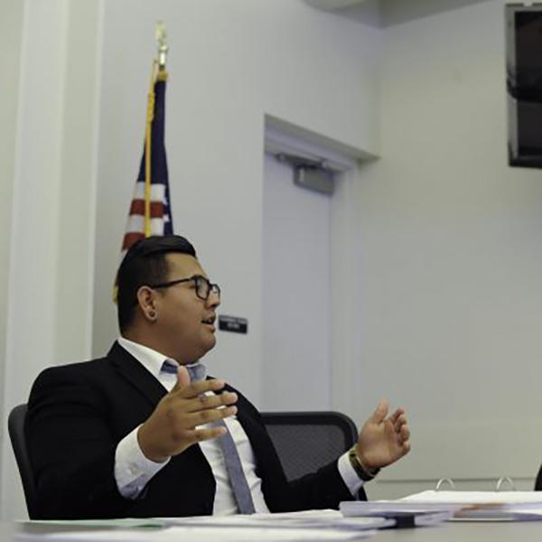 Palomar associate student government vice president, David Aguilar, delegating during an Associate Student Government meeting in SU- 204 on Sept. 23. Palomar associate student government vice president, David Aguilar, interacting with spectator Samuel Mbagwu, during a public ASG meeting in SU- 204 on Sept. 23,, 2016. (Idmantzi Torres/The Telescope)