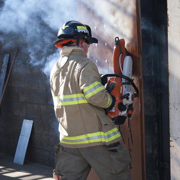 Cadet Wade Lippert practices cutting bolts at Palomar's Fire Academy located off campus on Sept. 30, 2016. (Christopher Jones/The Telescope)