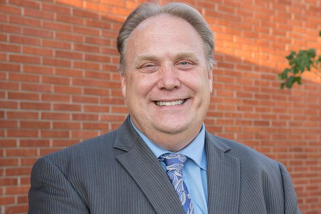 Tim Fillinger, candidate for the Palomar College Board of Directors poses while waiting for the debate to start in the Student Services Center on Oct. 18, 2016. (Joe Dusel/The Telescope)