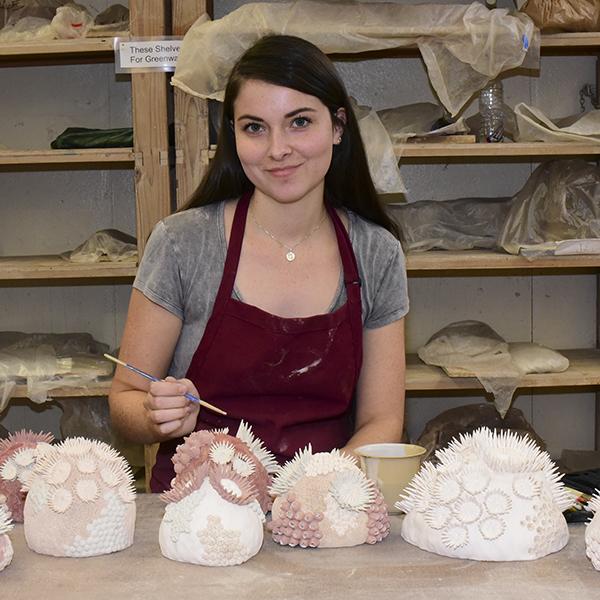 Palomar student Alayna Wenzlick loves clay shaping as she crafts a Sea Anemone. This is her fourth semester at Palomar she loves the positive attitude of the students and teachers at the campus. Nov 7, 2016. (Johnny Jones/The Telescope)