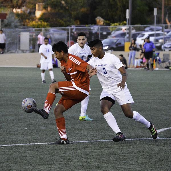 Palomar midfielder Luis Lopez (20) knocks the ball down inside the opponents box. Palomar was defeated 0-4 by MiraCosta Nov. 11 on Minkoff Field. The Comets finished the 2016 season (5-11-5). (Dylan Halstead/The Telescope)