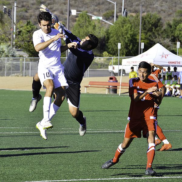 Palomar goalkeeper Luis Avila (26) beats oncoming Cuyamaca forward Maurico Amezcua (10) to a crossed in ball. Palomar was defeated 0-5 Oct. 21 on Minkoff Field. Dylan Halstead/The Telescope