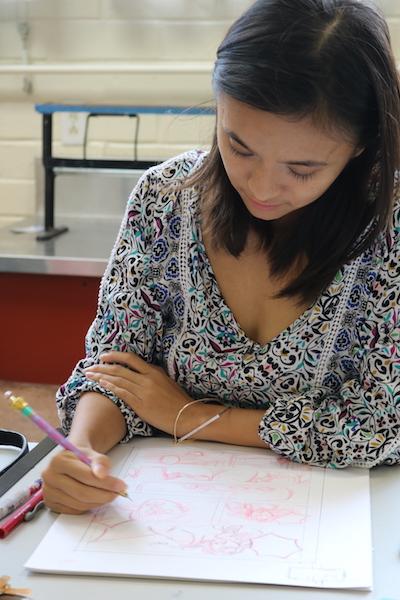 Palomar College student Stephanie Santiago sketches plans for an upcoming comic project in Concept Sketching, ARTI 100, taught by Vicki Walsh. (Michael Schulte/The Telescope)