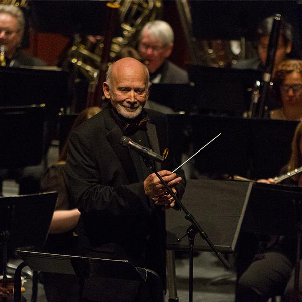 Kenneth Bell, musical director and conductor of the Palomar/Pacific Coast Concert Band, looks to the audience during the Heroes and Heroines Performance, Feb 24, 2017. (Savhanna Vargas/The Telescope)