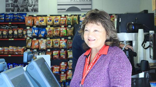 Martha Lomelino greeting students at the Snack Shack. (Coulter Mohill Smith/The Telescope)