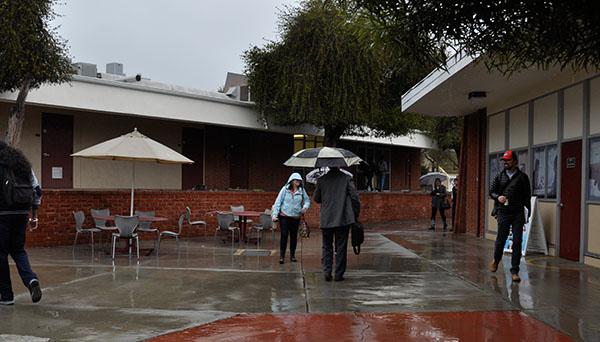 The umbrellas come out as Palomar students transit between classes during a rainy Monday afternoon on Feb 6. 2017. (Johnny Jones/The Telescope)