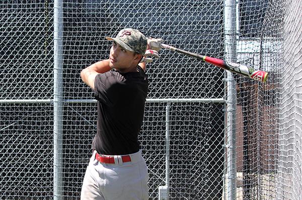 Cameron Haskell hits the ball at practice on March 30, 2017 at the Palomar College Ballpark. (Coleen Burnham/The Telescope)