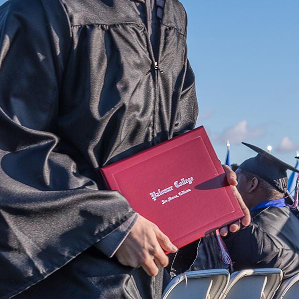 Happy and well educated graduating students proudly receive their diplomas at the commencement ceremony at Palomar College in San Marcos, Calif. on May 26, 2017. (Joe Dusel/The Telescope)