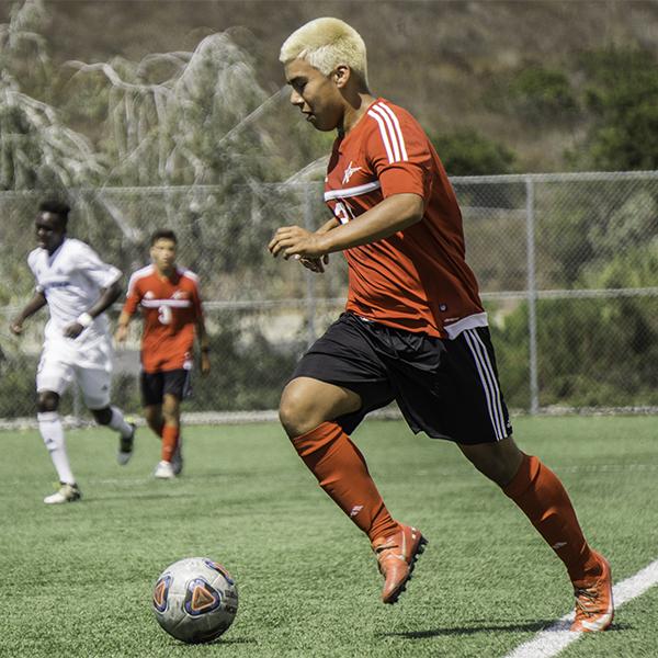 Palomar forward Ronny Rubio advances the ball forward during the game against Mira Costa on Sept. 22, 2017, at Minkoff Field. The final score was 2-1 in favor of Cuyamaca. (Anthony Cole/ The Telescope)