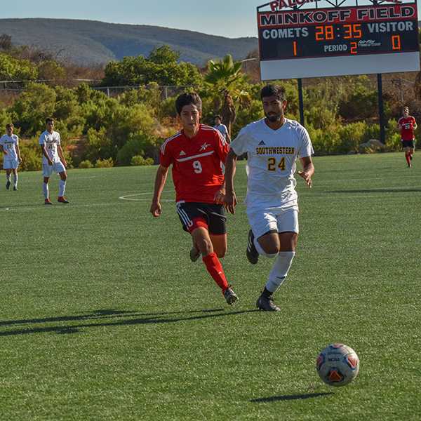 Romero Hernandez and Southwestern College Antonio Garcia both head for the ball during the game against Southwestern College on Sept. 26, 2017 at the Minkoff Field Palomar College. (Victoria Bradley/The Telescope)