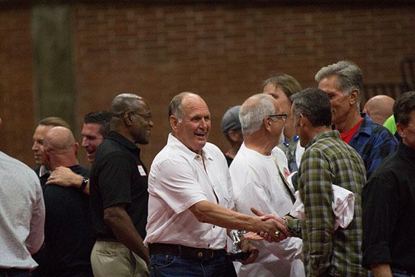 John Woods being congratulated after being awarded his statue. Alexis Metz-Szedlacsek (@skepticully) / The Telescope