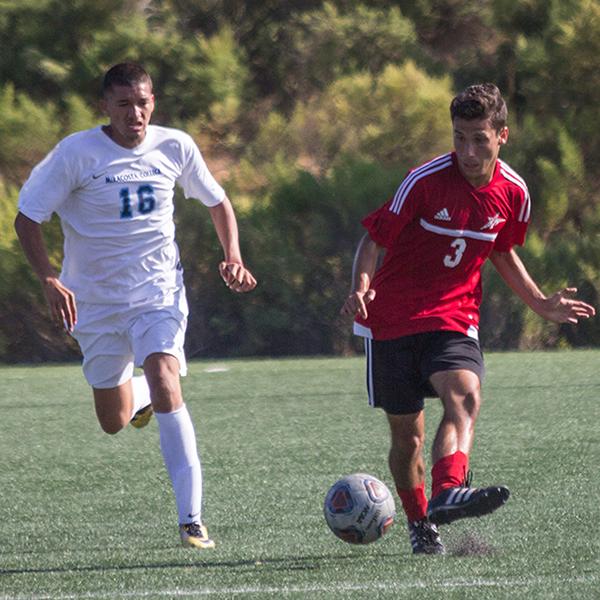 Palomar's Anthony Lew kicks the ball at the Men's Soccer game at Minkoff Field against Mira Costa. The final score was 2-1 in favor of Mira Costa. (Alexis Metz-Szedlacsek/The Telescope)