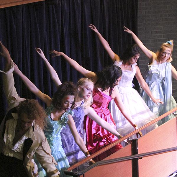 Zombie Prom Dancers strike a pose during dress rehearsal on Oct. 5, 2017 in the Bruebeck Theatre. Music Danse Macabre by Saint Saens accompanied by the Palomar Pacific Coast Concert Band and Choreography by Molly Faulkner. (Julie Lykins/The Telescope)