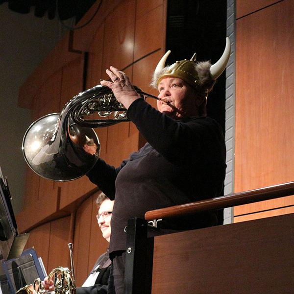 A French horn player, Cindy Monohan is playing solo for explaining the instrument at Howard Brubeck Theatre on Dec. 3, 2017. (Momoko Watarai/The Telescope)