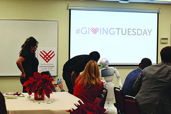 Pepper, Artificial Intelligence robot is introduced to the Faculity and Staff during the the Giving Tuesday Celebration put on by the Palomar College Foundation which it gave a small demestration. Nov.28, 2017. Palomar College. (Victoria Bradley/The Telescope)