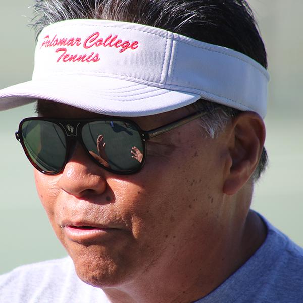 Tennis coach Ronnie Mancao talks to players Will Molenkamp and Ricardo Campos during break. Wednesday Feb. 7, 2018. (Cameron Niven/The Telescope)