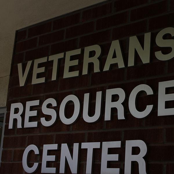 The new sign of the Veterans resource center during the opening event, March 16, 2018. (Aubree Wiedmaier/The Telescope)