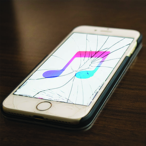 Spotify music versus Apple music. (Emily Whetstone/The Telescope)