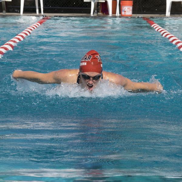 Palomar comet, Rebekah Blackburn, doing the butterfly during the 100 yard butterfly. (Emily Whetstone/The Telescope)