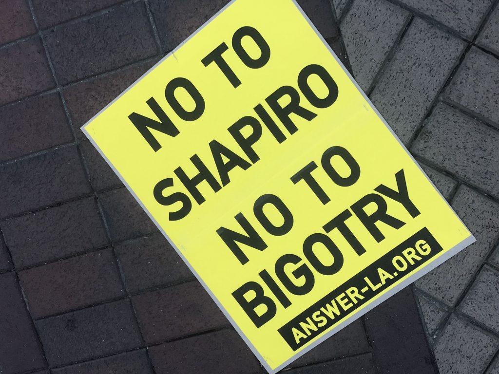 Protest sign featured at the Ben Shapiro lecture on the University of Southern California. (Jeremiah Tatola/The Telescope)