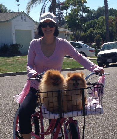 April woods biking with her two dogs