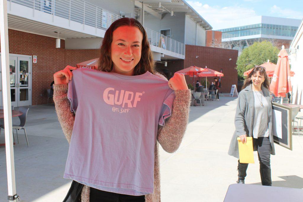 Student Madelyn Dorin shows off her new shirt from the Comet’s Closet. (Megan Lammott/The Telescope)