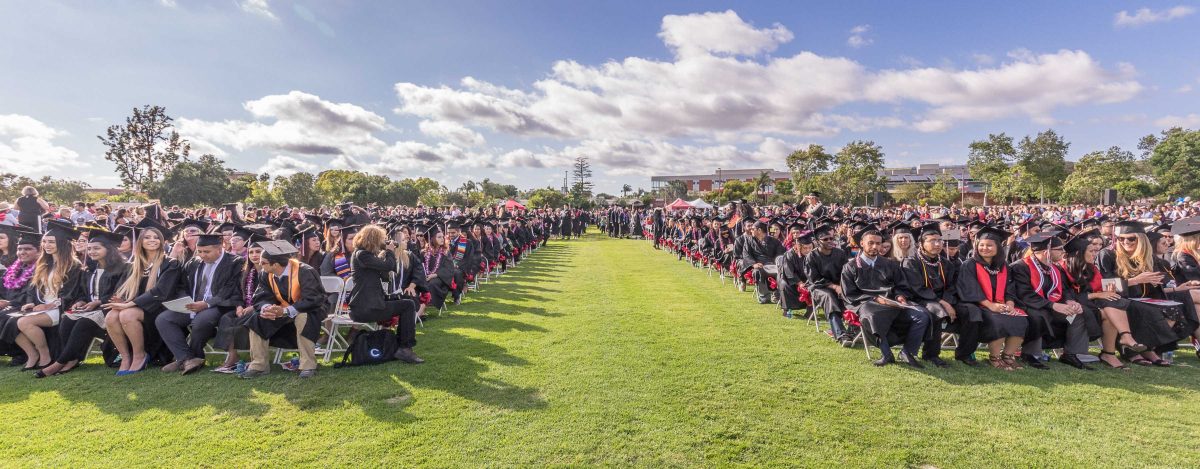 Happy graduating students file in and take their seats the commencement ceremony at Palomar College in San Marcos, CA on May 26, 2017. Joe Dusel / The Telescope.