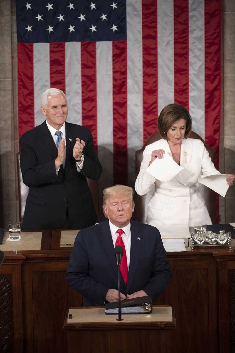 House Speaker Nancy Pelosi (R, back) tears up what appeared to be a copy of the president&apos;s speech during U.S. President Donald Trump&apos;s (front) State of the Union address to a joint session of Congress on Capitol Hill in Washington D.C. on Feb. 4, 2020. (Liu Jie/Xinhua via ZUMA Wire/TNS)