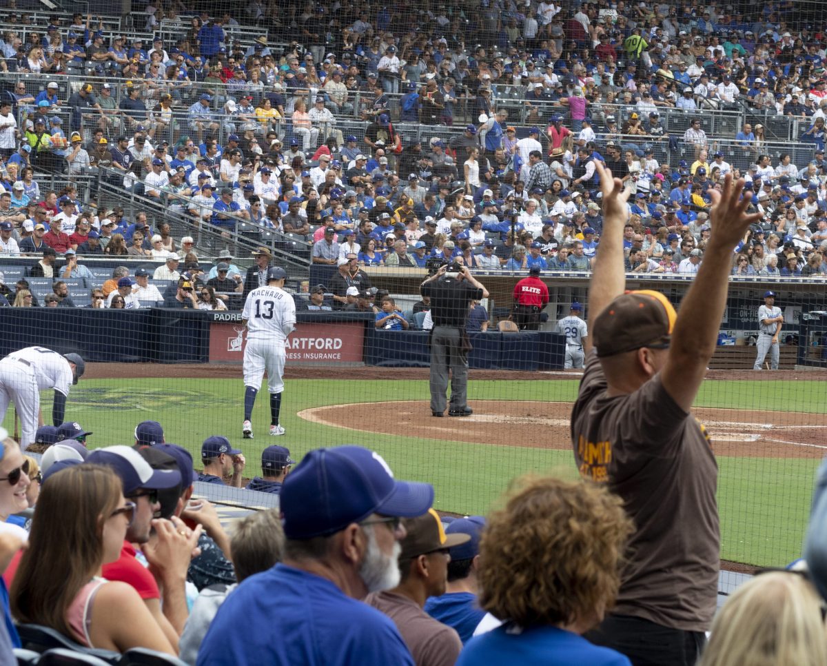 Padres' Manny Machado walking up to bat.