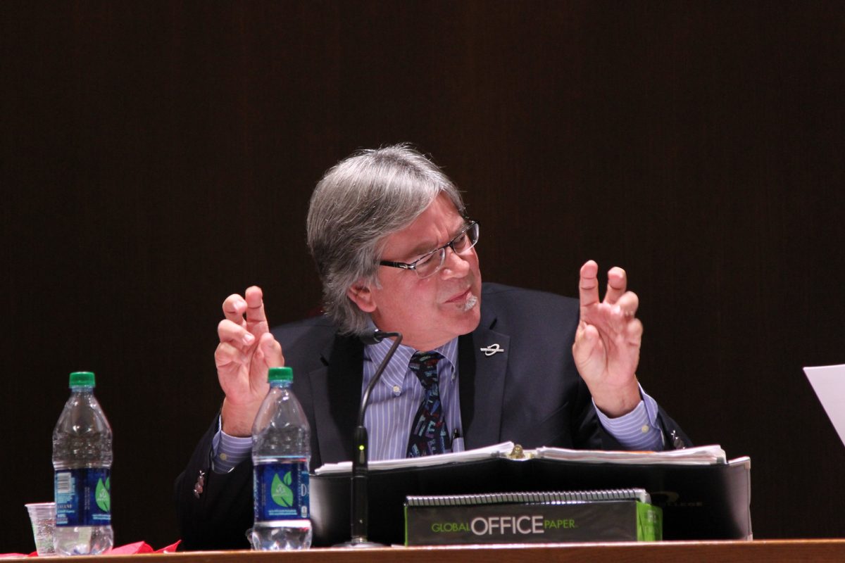 Mark Evilsizer discusses an issue at a board meeting on Sept. 9, 2015. (Erika Shasky/The Telescope)