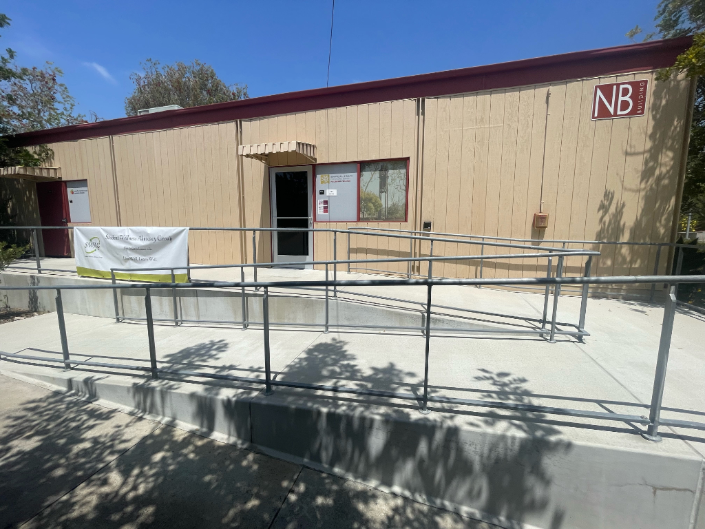 The front entrance of Palomar College's Behaviorial Health Center on a sunny day.