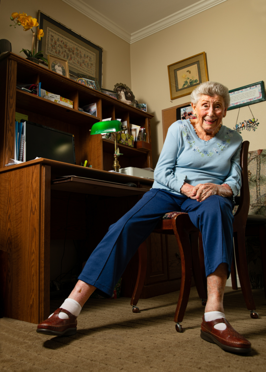 Lorraine Boyce sits at her desk at home