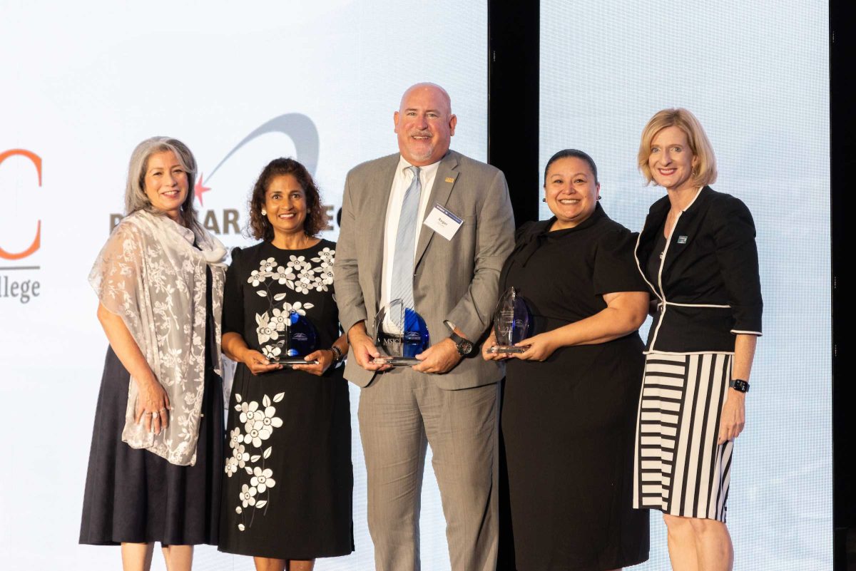 Dr. Star Rivera-Lacey stands with other awardees at Cal State University of San Marcos' Community Partner of the Year event. Photo credit: Courtesy of Palomar College