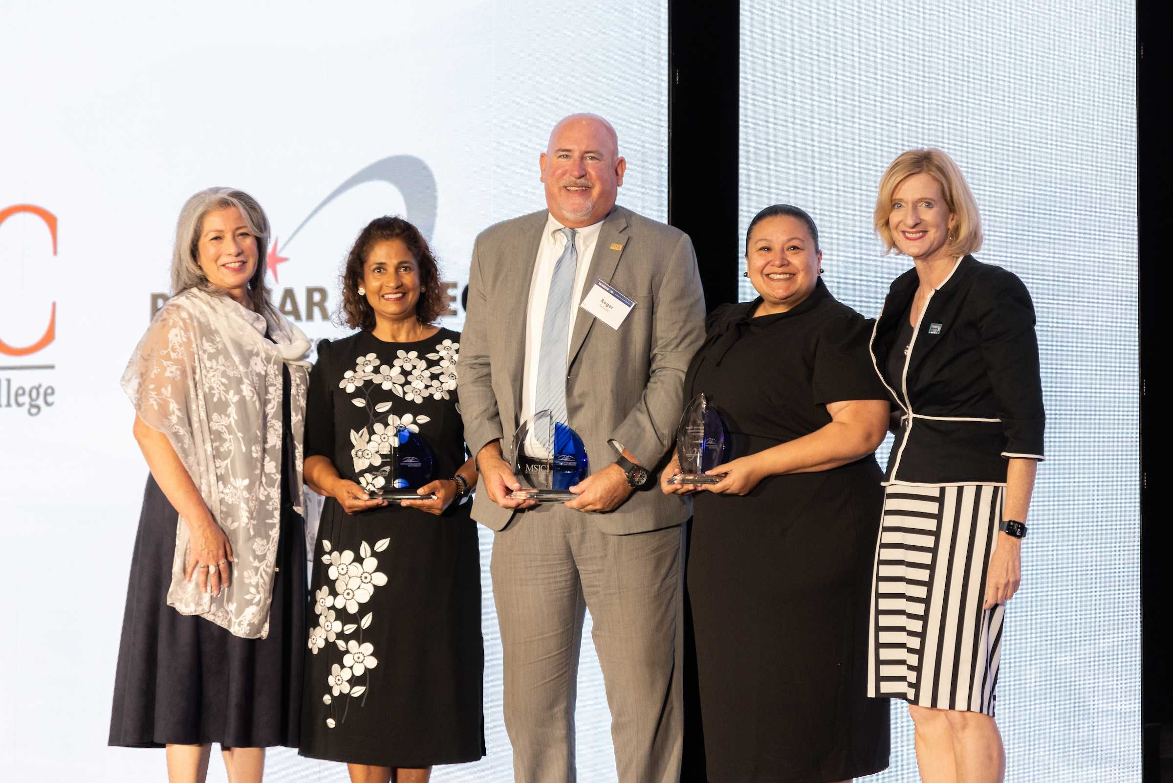 Dr. Star Rivera-Lacey stands with other awardees at Cal State University of San Marcos' Community Partner of the Year event. Photo credit: Courtesy of Palomar College
