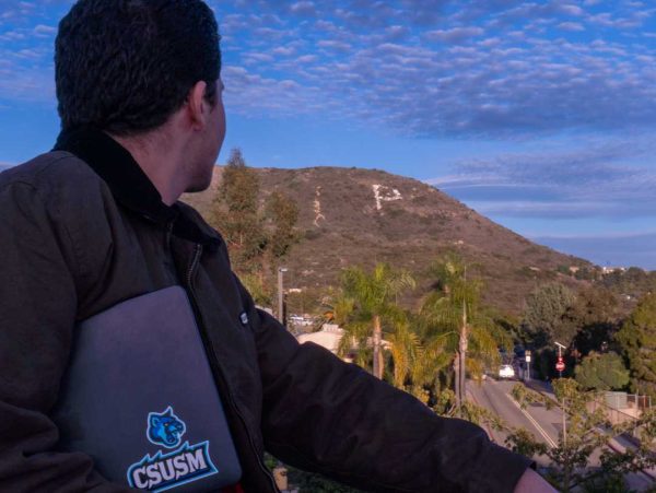 CSUSM student Anthony Hernandez reflects on his decision to attend CSUSM over Palomar College. Photo credit: Josh Miranda