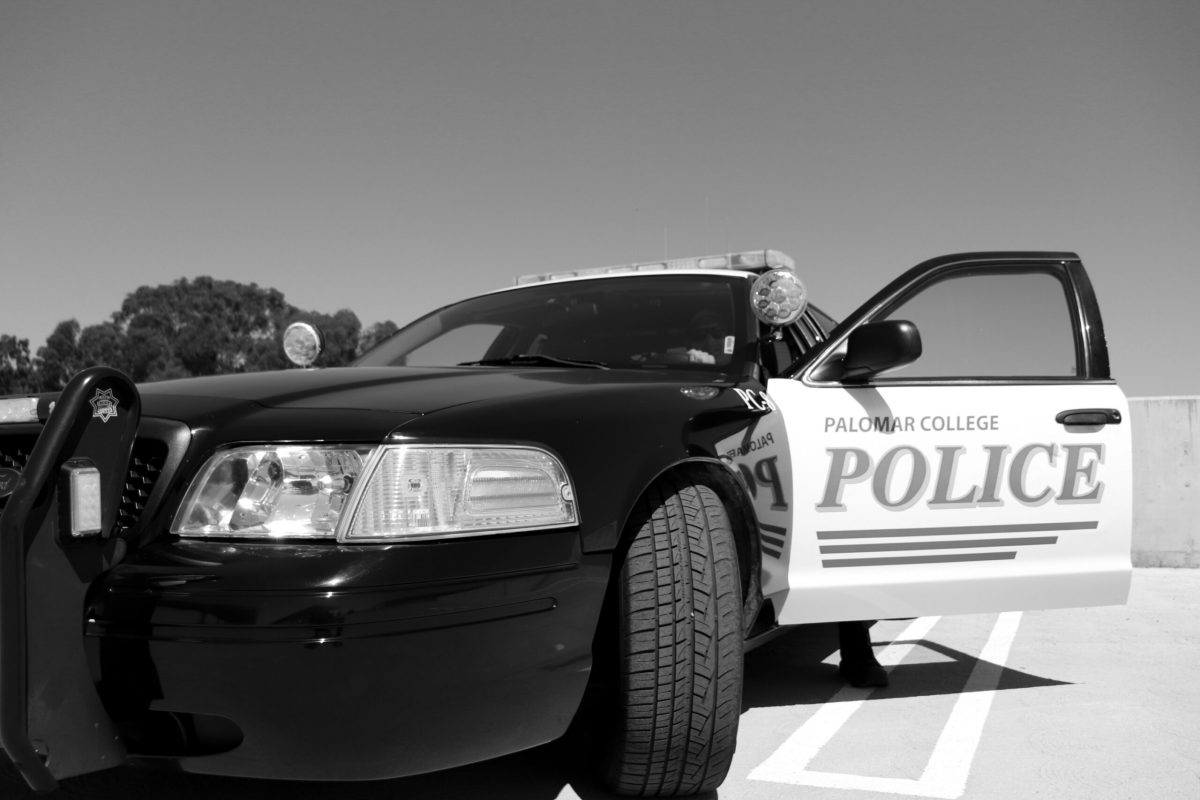 Palomar Police Department cruiser parked on the roof of the San Marcos campus parking structure.