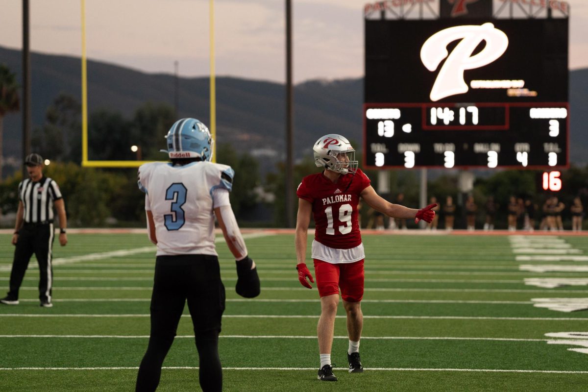 Jake Whitehead, wide receiver, lines up against Vance Harris, Moorpark College's defensive back.