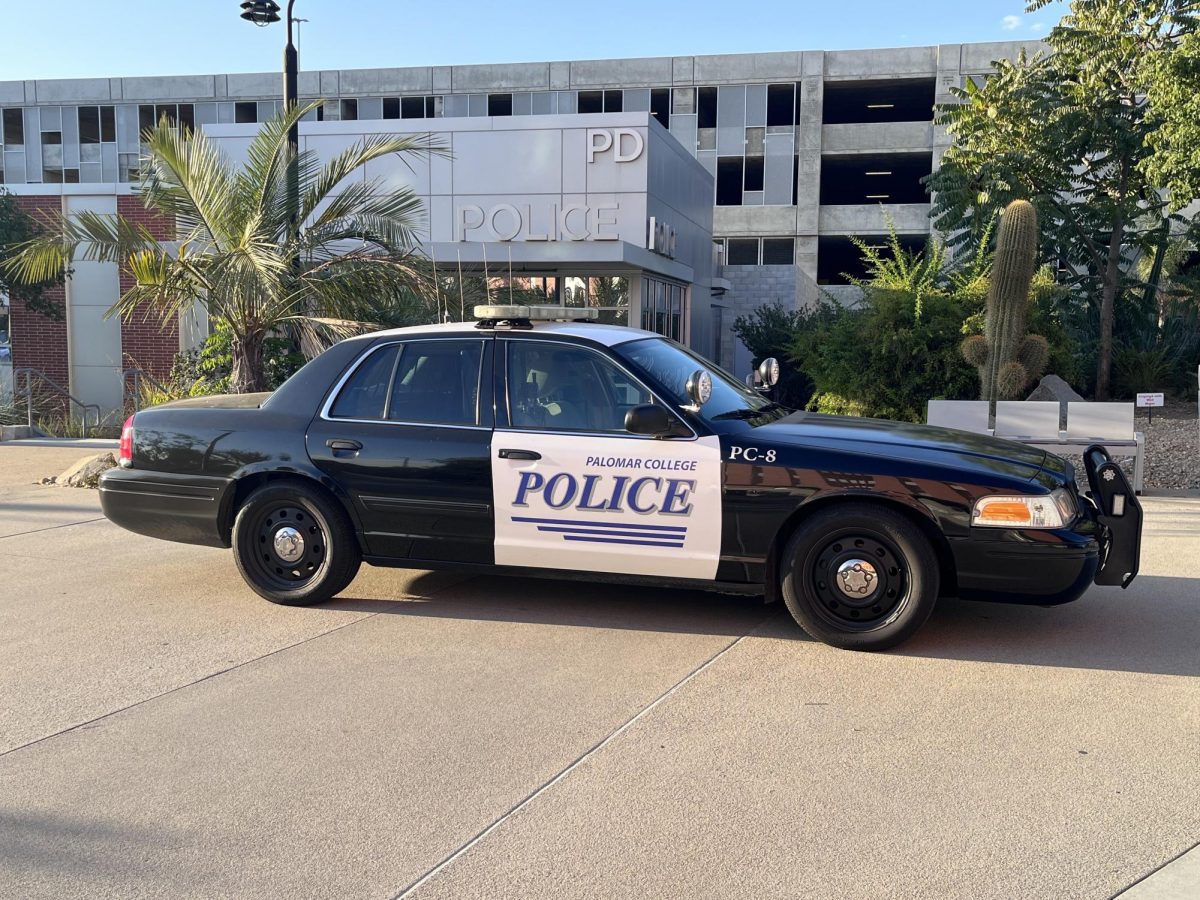 A Palomar College PD cruiser parked outside the police station, which is located in front of the parking garage at the San Marcos campus.