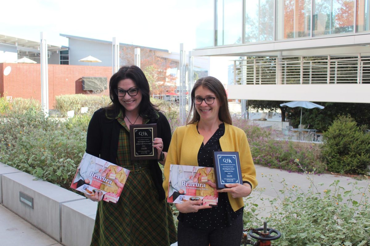 Stacey Trujillo (left) and Claire Rolens (right) advise the Bravura program, which won a first place award for the literary magazine.