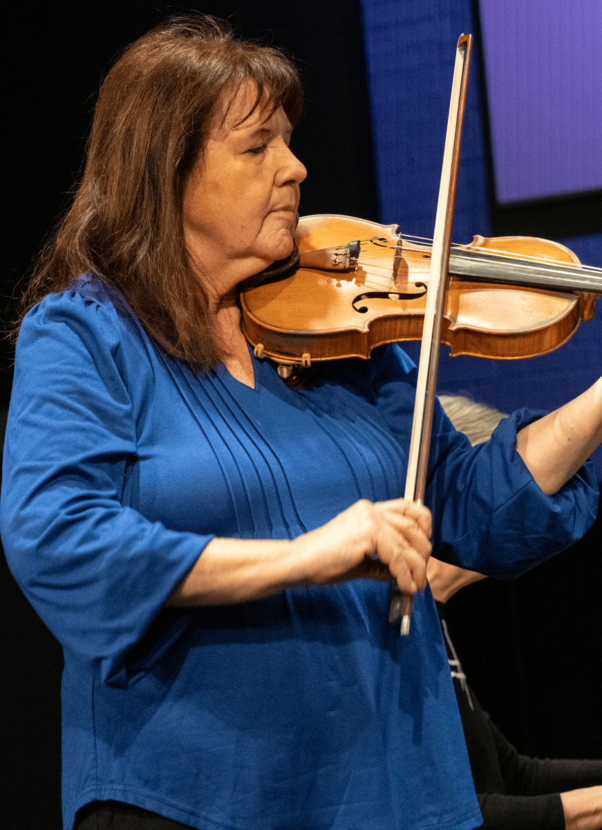 Alyze Dreiling bows her violin. Dreiling was a semi-finalist in the European Union Conducting Competition in 2018.