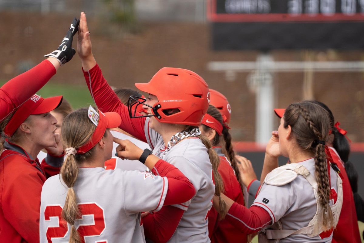 #15 Alexis Huey celebrates with teammates after her three-run home run that gave the Comets an 11 -3 victory over San Diego City College on April 17 in San Marcos, CA.